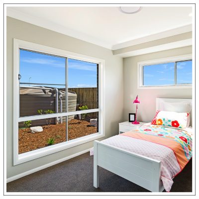 Australian made white aluminium sliding window in childrens bedroom